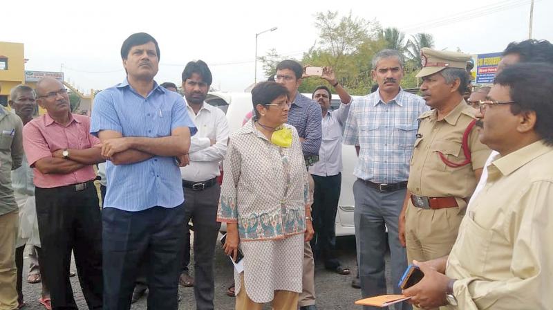 Puducherry Lt Governor Kiran Bedi visits the dump yard in Bahour area along with other officials.