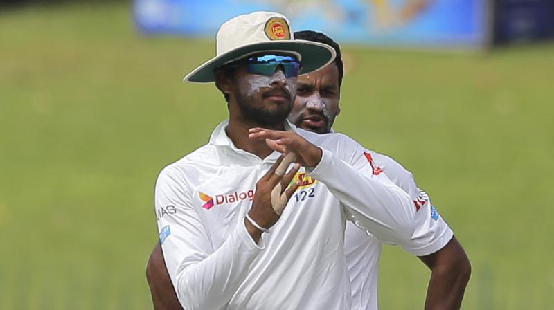 Dinesh Chandimal believes that his team \greatly missed\ the services of Asela Gunaratne in the Galle Test. (Photo: AP)