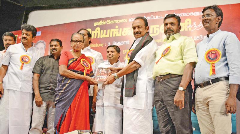 Padmavathy Ammal, mother of Nalini, Rajiv Gandhi assassination convict, receives the first copy of her daughters book from MDMK chief Vaiko at a function in the city on Thursday evening. (Photo: DC)
