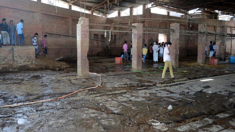 An illegal slaughterhouse in Choka Ghat area of Varanasi which was sealed by the authorities. (Photo: PTI)