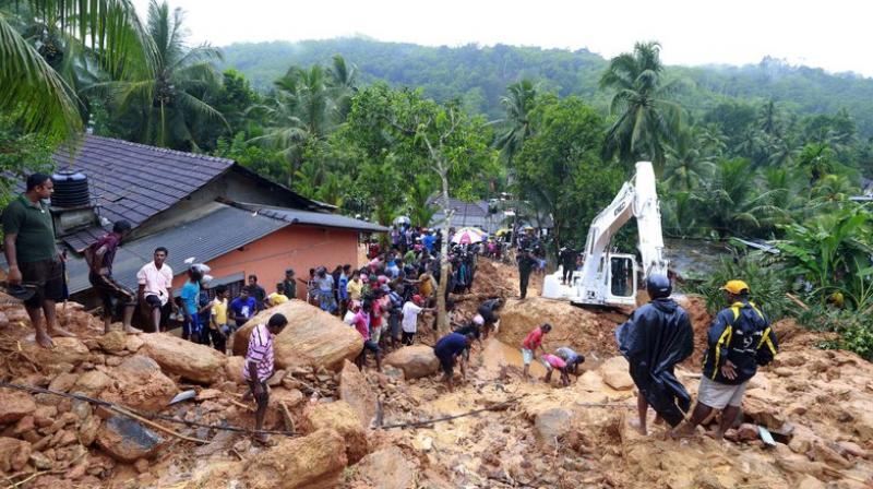 Sri Lanka has appealed for outside help as the death toll from floods and mudslides on Saturday rose to 100 with 99 others missing.