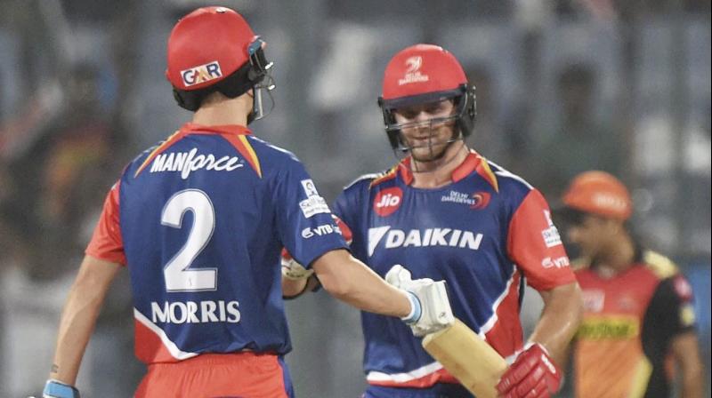 Delhi Daredevils batsmen Chris Morris and Corey Anderson greets each other after playing the winning shot against Sunrisers Hyderabad during an IPL match in New Delhi on Tuesday. (Photo: AP)