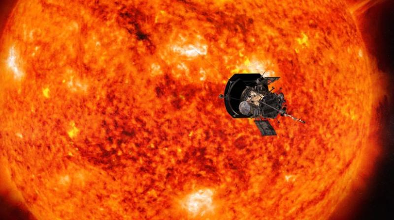 This illustration from NASA shows the Parker Solar Probe spacecraft approaching the sun. Launched in August 2018, the spacecraft will get a gravity assist on October 3, 2018, as it passes within 1,500 miles of Venus. (Steve Gribben/Johns Hopkins APL/NASA via AP)
