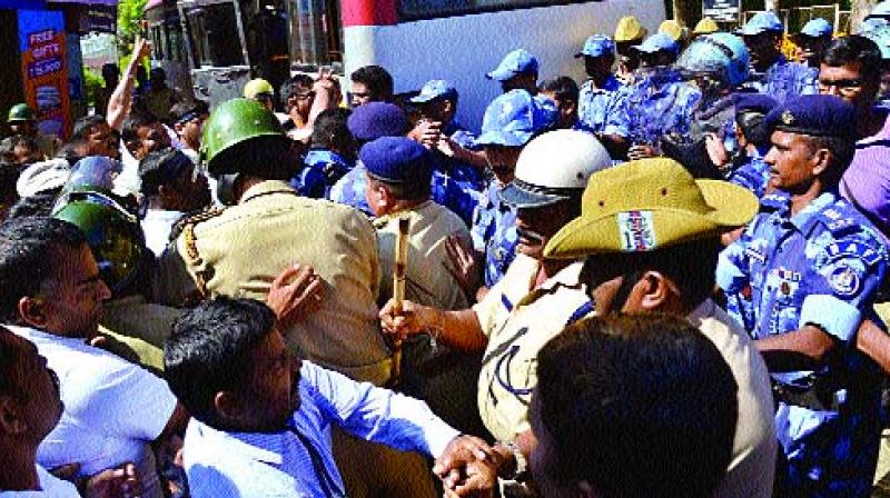 BJP activists court arrest in Madikeri on Friday (Photo: KPN)