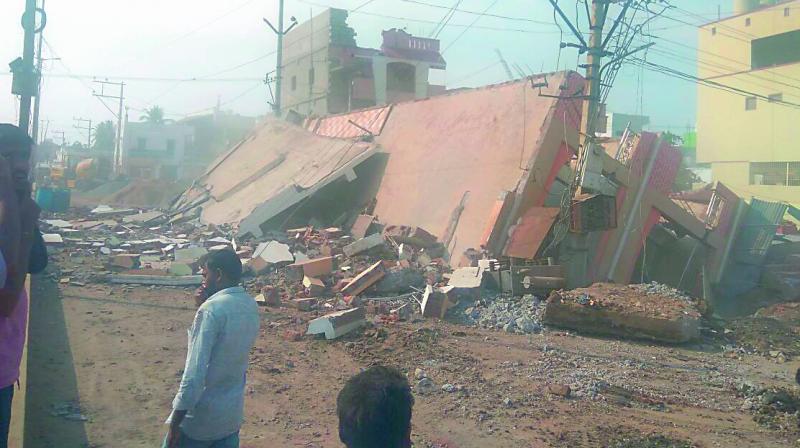 The three-storied building on Nandivelugu road at Guntur that collapsed on Saturday evening. (Photo: DC)