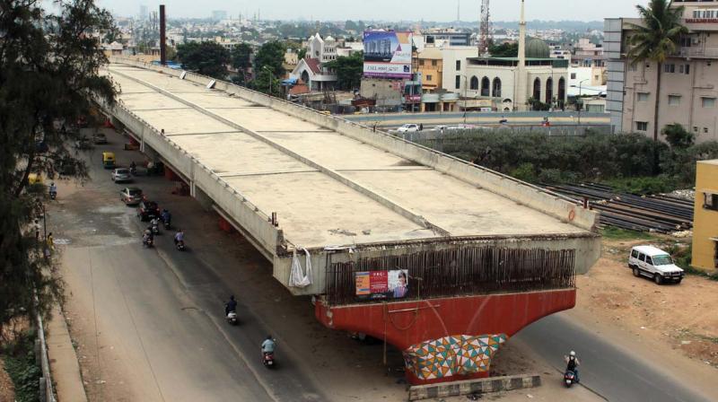 The work on Hennur flyover began in 2009 but is still incomplete, causing misery to motorists (Photo: DC)