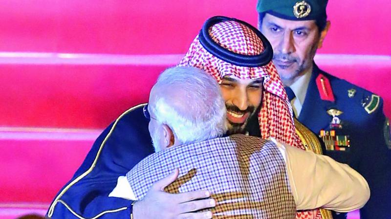 Prime Minister Narendra Modi welcomes Saudi Crown Prince Mohammed bin Salman on his arrival, at Palam Air Force Station in New Delhi on Tuesday. India and Saudi Arabia will release a joint statement on Wednesday following a meeting between the Saudi prince and Mr Modi, in the backdrop of the Pulwama terror attack. (Photo: AP)