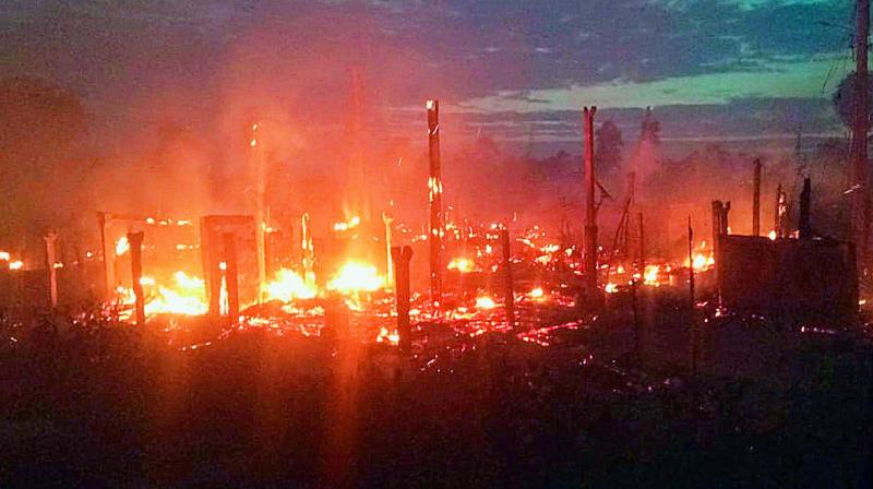 About 33 thatched houses were reduced to ashes in a major fire that broke out in Jangala Colony of Konthamuru village in Rajahmundry Rural on Monday.  (DC)