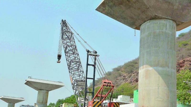 Kanakadurga flyover works in progress at One Town in Vijayawada.