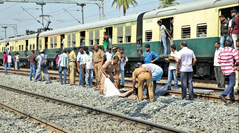 Government railway cops of the Egmore division clear the bodies and move the injured in the train mishap to a government hospital. (Photo: DC)