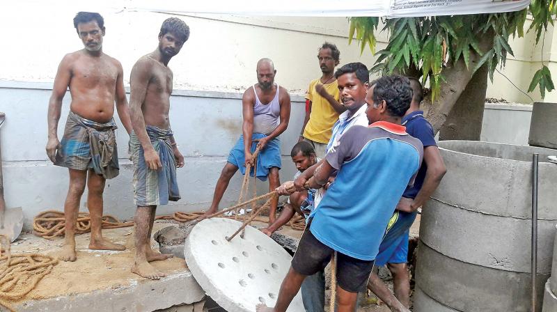 Workers start on construction of a recharge well in Mylapore. 	Image: DC