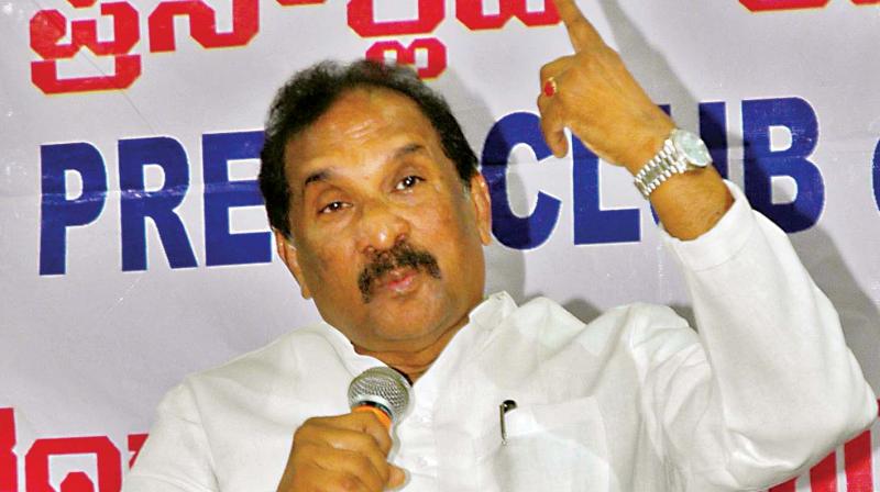 Minister KJ George addressing reporters at the Press Club, in Bengaluru on Tuesday (Photo: DC)
