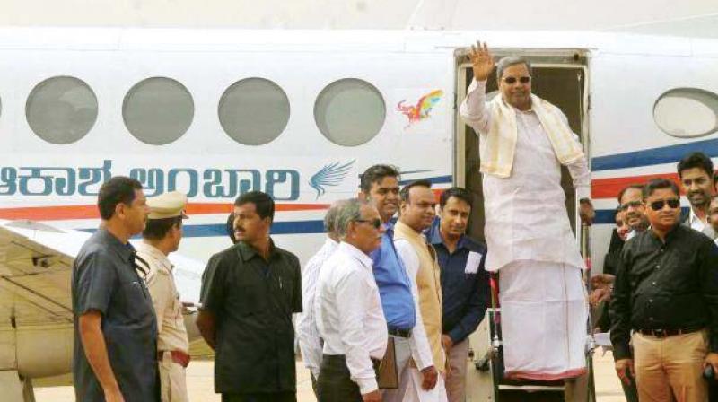 A file photo of Chief Minister Siddaramaiah inaugurating Akasha Ambariflight service from Bengaluru to Mysuru for Dasara in 2016.