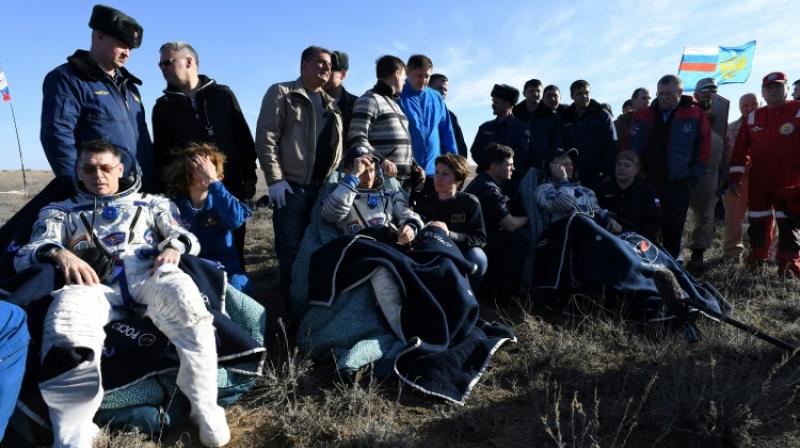 A Soyuz MS-02 capsule brings Russian cosmonauts Sergey Ryzhikov and Andrey Borisenko and US astronaut Shane Kimbrough back home after a 173-day mission to the International Space Station  (Photo: AFP)