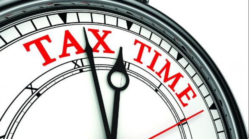 Note-ban bites income tax dept,Q4 advance tax mop-up falls 10 per cent