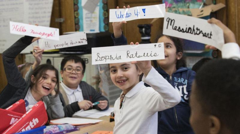 Students display some of their cursive writing work and exercises at P.S. 166 in the Queens borough of New York. (Photo: AP)