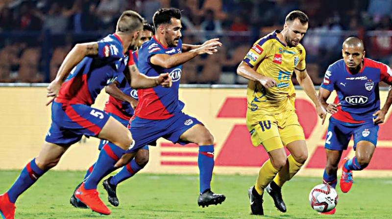 Matej Poplatnik, second right, of Kerala Blasters FC takes control of the ball during the Hero Indian Super League (ISL) match  (Photo: AP)