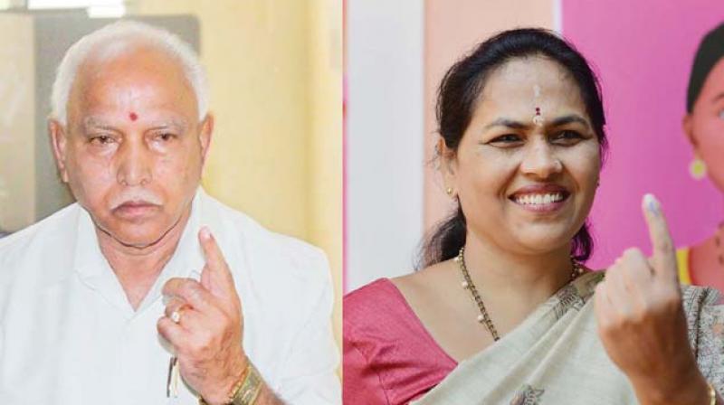 BJP leaders B.S. Yeddyurappa and Shobha Karandlaje, after casting votes in their respective constituencies on Saturday 	(Image: DC)