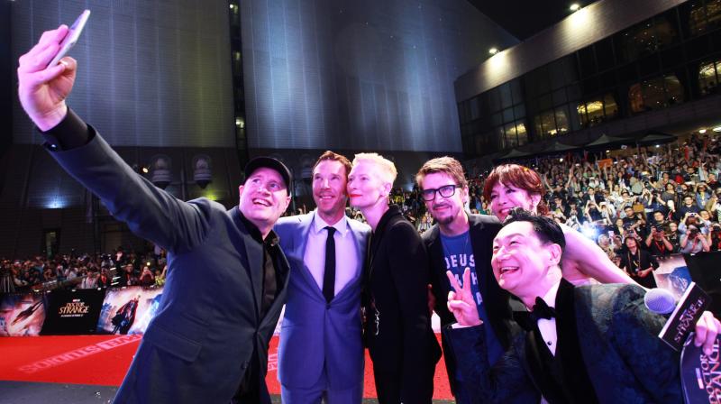 Doctor Strange team pose for a selfie.