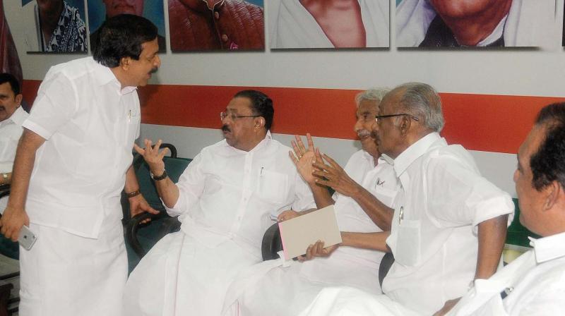 Leader of opposition Ramesh Chennithala, KPCC president M. M. Hassan, former chief minister Oommen Chandy and K.C. Joseph, MLA, at the political affairs committee meeting at KPCC office in Thiruvananthapuram on Wednesday. 	(Photo: A. V. MUZAFAR)