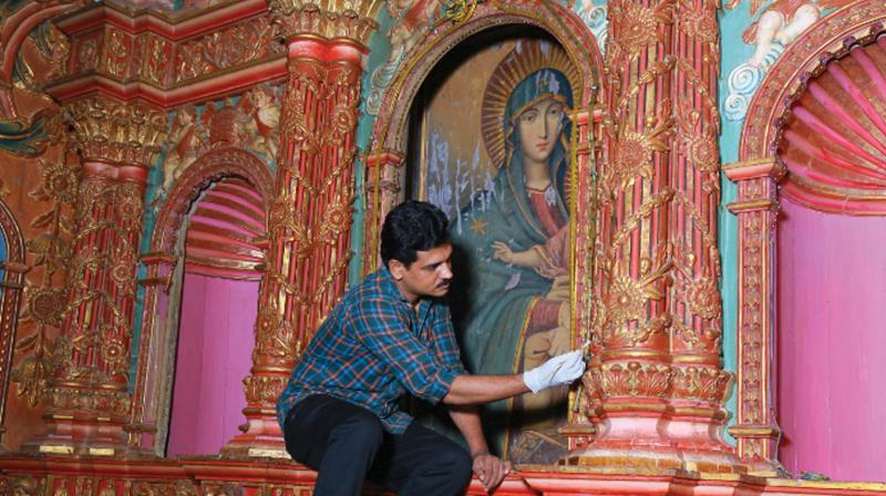 Renovation of historic paintings being carried out at Kudavechoor Church, Vechoor, Kottayam. (Photo: DC)