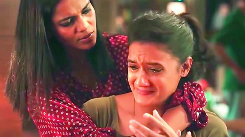 A still from one of the campaigns videos, that shows a girl crying.