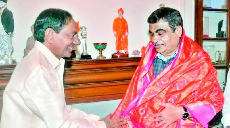 Chief Minister K. Chandrasekhar Rao with highways water resources minister Nitin Gadkari in New Delhi on Monday.