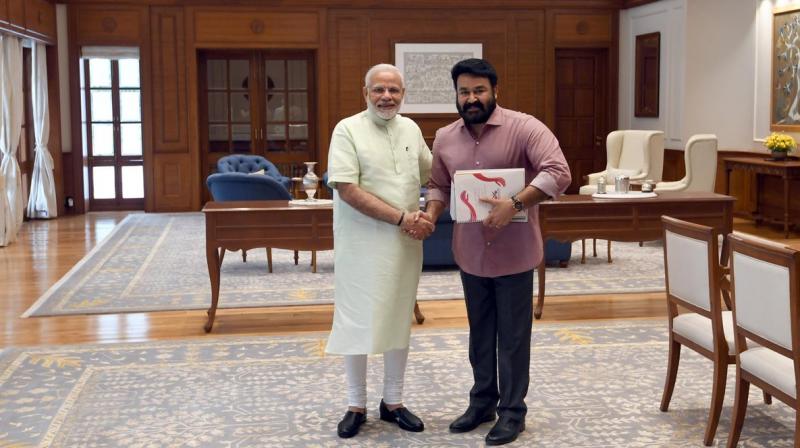Malyalam superstar Mohanlal met Prime Minister Narendra Modi on Monday to brief him about the social works his organisation is carrying out.