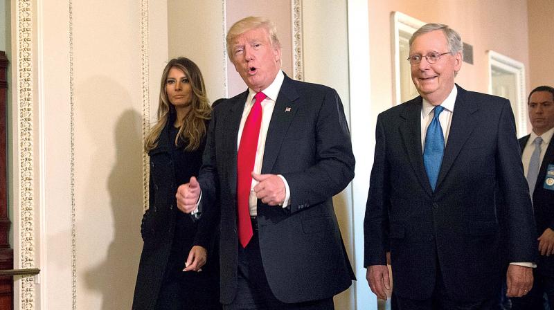 President-elect Donald Trump, accompanied by his wife Melania, and Senate Majority Leader Mitch McConnell at Capitol Hill (Photo: AP)
