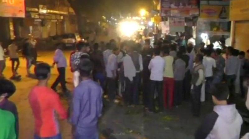 Residents of the area blocked the tracks staging protests. They claimed that the area is dimly lit at night and no announcements are made for an arriving train. (Photo: Twitter | ANI)