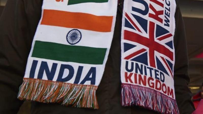 A scarf worn by an Indian-origin man at a welcome rally for Prime Minister Narendra Modi at Wembley Stadium in London on November 13, 2015. (Photo: AFP)