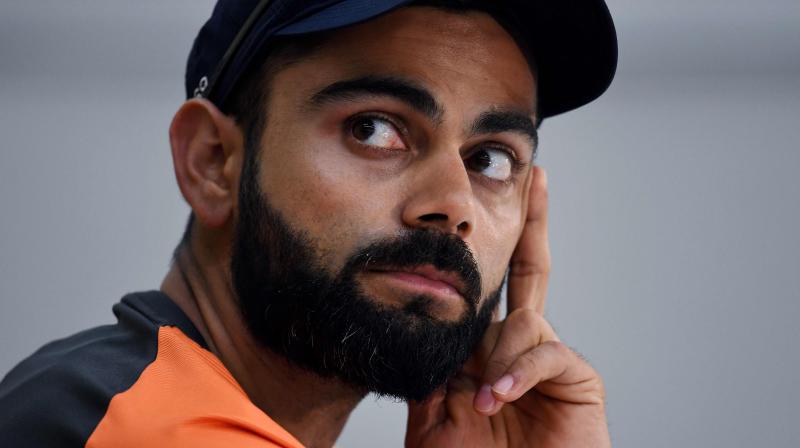 Virat Kohli might have come under sharp criticism from various quarters for his on-field aggressive behaviour but former Australia spinner Brad Hogg Saturday defended the India captain, saying the visiting team derives energy from him. (Photo: AFP)