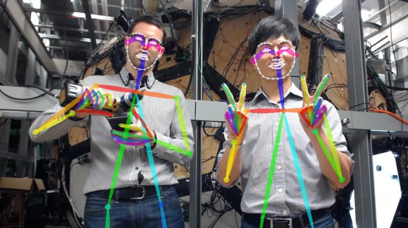 This real-time detector sees hand poses and tracks multiple people. (Image: Carnegie Mellon University)