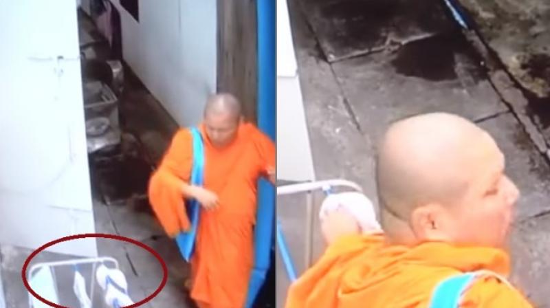 Police are looking for the monk in the footage (Photo: YouTube)