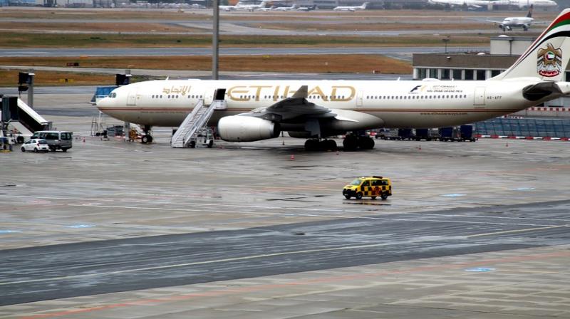 He climbed the fence and sneaked on to the runway, to try and enter a plane (Photo: AFP)
