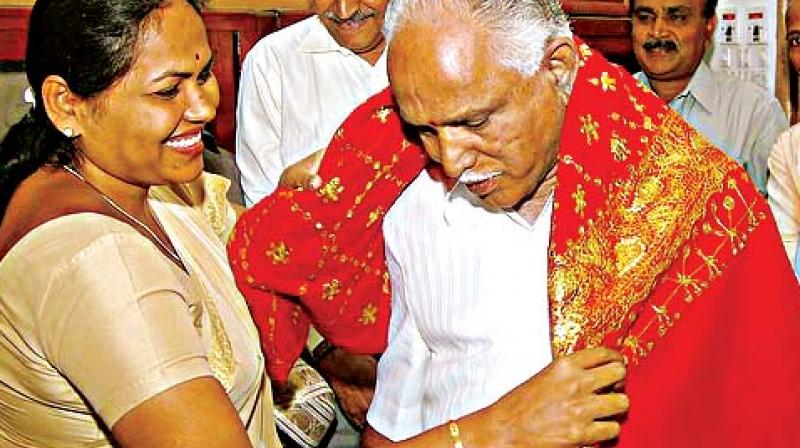 Udupi-Chikkamagaluru MP Shobha Karandlaje with party state president B.S. Yeddyurappa in a file photo