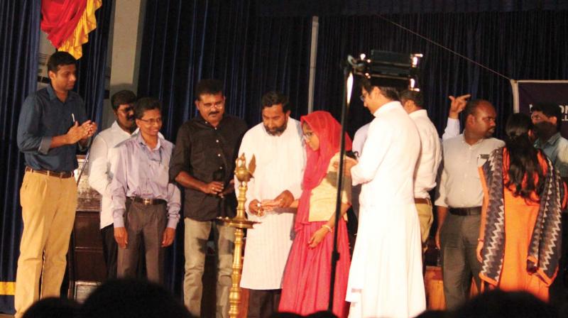Father George Kannanthanam inaugurates the eye donation programme at the CMS College on Tuesday.