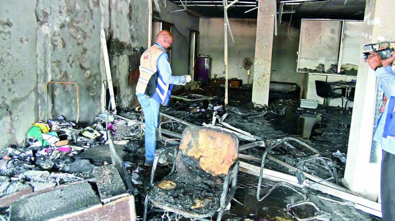 Property damaged after fire broke out at the Honda two-wheeler showroom near Bazaar Ghat crossroad at Nampally on Sunday.