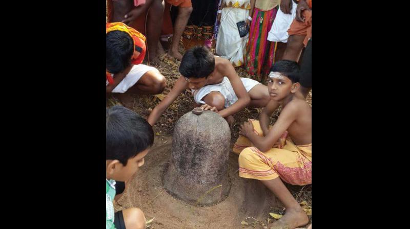 A Shiva Lingam reinstated at the paddy filed near Keezhthali Temple, which is the proposed location of the open Shiva Temple in Thali Village.