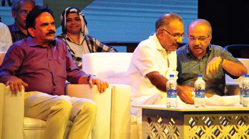 Kozhikode  district collector U.V. Jose, transport minister A.K. Saseendran and A. Pradeepkumar, MLA, at the concluding session of the Kerala Literature Festival on Sunday.