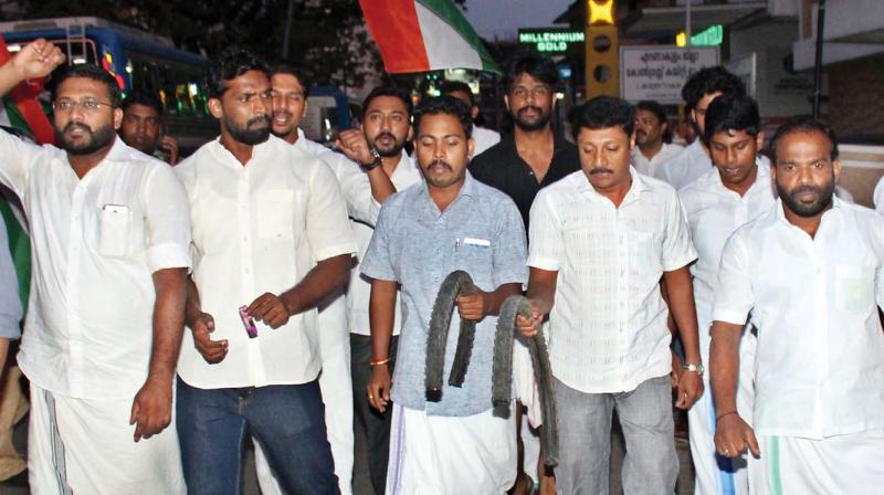 Youth Congress activists take out a march to protest the killing of Shuhaib in Kochi on Tuesday.