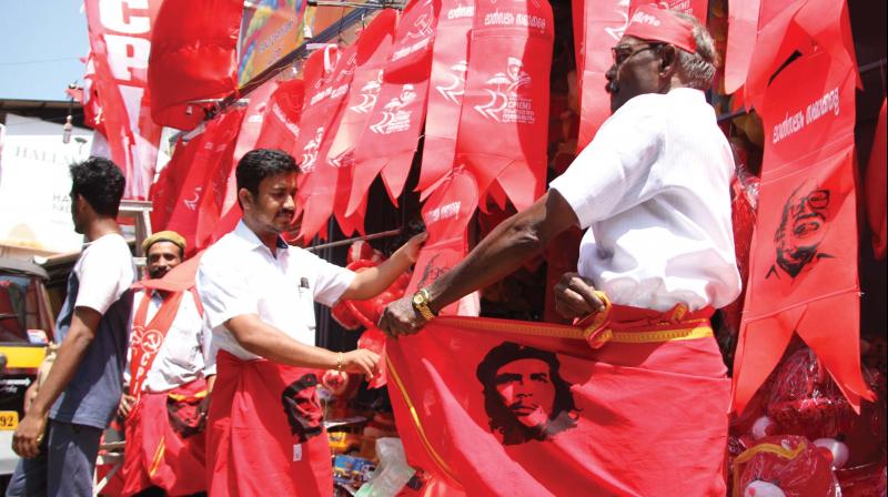 Dhotis printed with Che Guevaras face being sold ahead of the CPM state conference of in Thrissur on Thursday. 	(Photo:  Anup K. Venu)