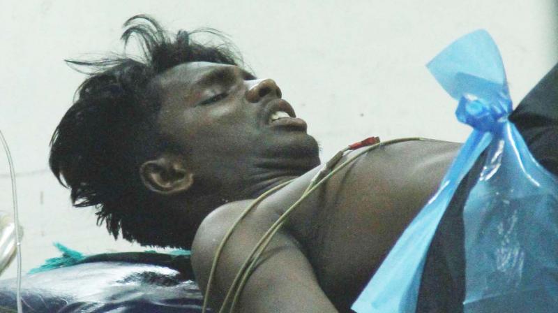 One of the victims from Thiruvalla being treated at the Kottayam Medical College on Saturday.  (Photo: Rajeev Prasad)