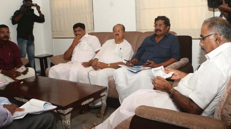 Transport minister A.K Saseendran with the representatives of private bus operators at the guest house in Kozhikode on Sunday. (Photo: DC)