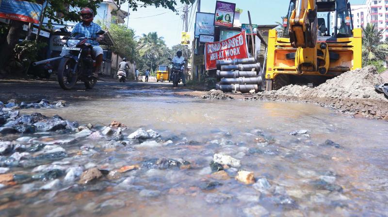 The Ambalamukku-Muttada road is flooded with water in Thursday after the pipe burst at Ambalamukku. 	 A.V. MUZAFAR