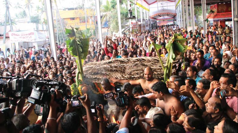 Kappukettu ritual in progress at Attukal Devi temple , which mark the beginning of the Attukal Pongala festival , on Thursday in Thiruvananthapuram.  	(Photo: Peethambaran Payyeri )