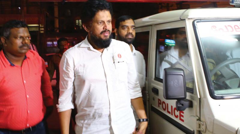 Peace School chairman M.M. Akbar being brought to Central police station in Kochi.