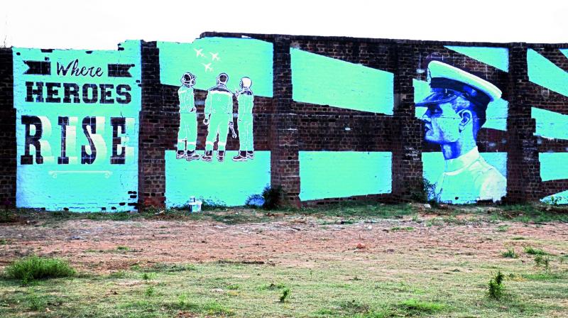 Artiste Sonali Upadyayas graffiti on an abandoned wall near Vizag airport.