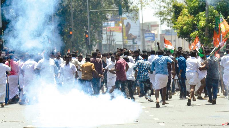 Police use teargas shells against Youth Congress activists as their Secretariat march turned violent on Monday. (Photo: Peethambaran Payyeri)