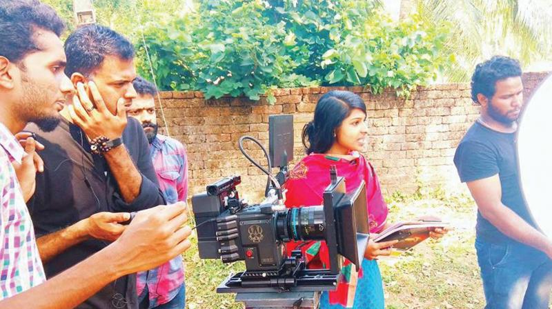 Najma Nishad during the shooting of her documentary on Thevanasan, the dalit folk artiste.